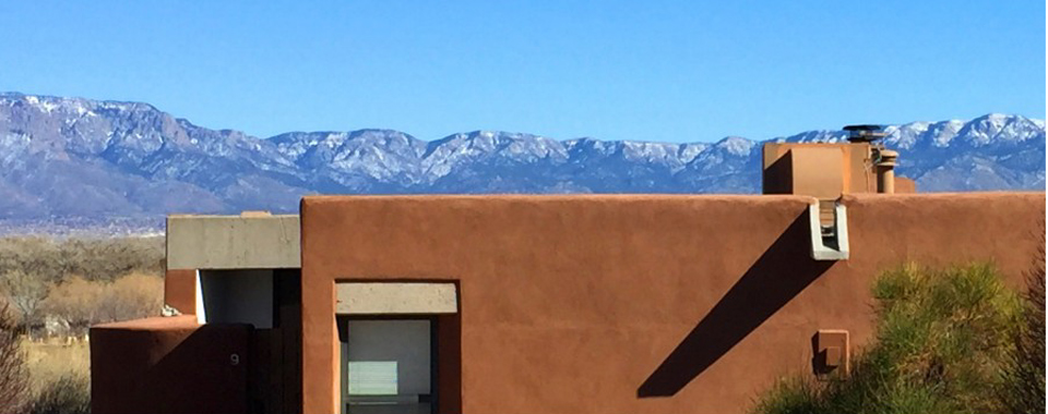 A La Luz adobe home facing east to Sandia Mountains A La Luz adobe home facing east to Sandia Mountains